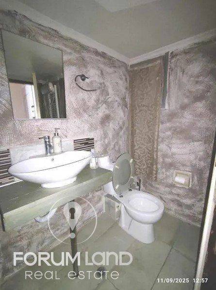 Forumland Real Estate, Μπάνιο