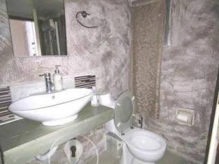 Forumland Real Estate, Μπάνιο