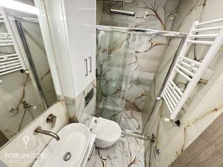 Forumland Real Estate, Μπάνιο