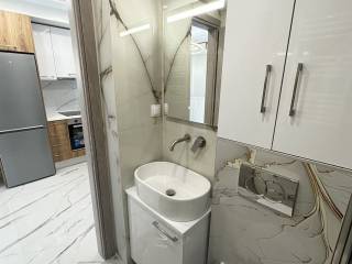 Forumland Real Estate, Μπάνιο