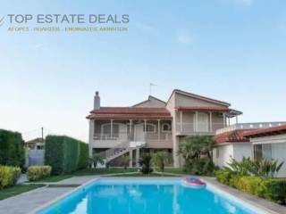 piso pleyra spitioy,pisina dexia estiatorio-spitaki