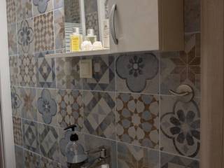 Forumland Real Estate, Μπάνιο