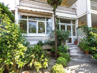 OUTSIDE VIEW OF THE BUILDING - FRONT GARDEN