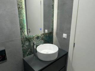 Forumland Real Estate, Μπάνιο