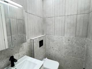 Forumland Real Estate, Μπάνιο