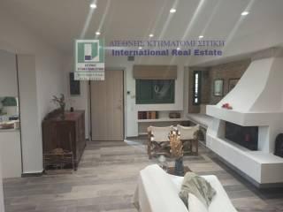 ENIAIOS CHOROS SALONI ME TZAKI-TRAPEZARIA STO ISOGEIO