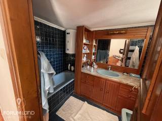 Forumland Real Estate, Μπάνιο