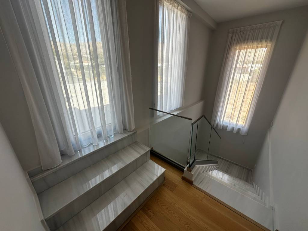 Stairs and exit to the veranda on the 1st floor