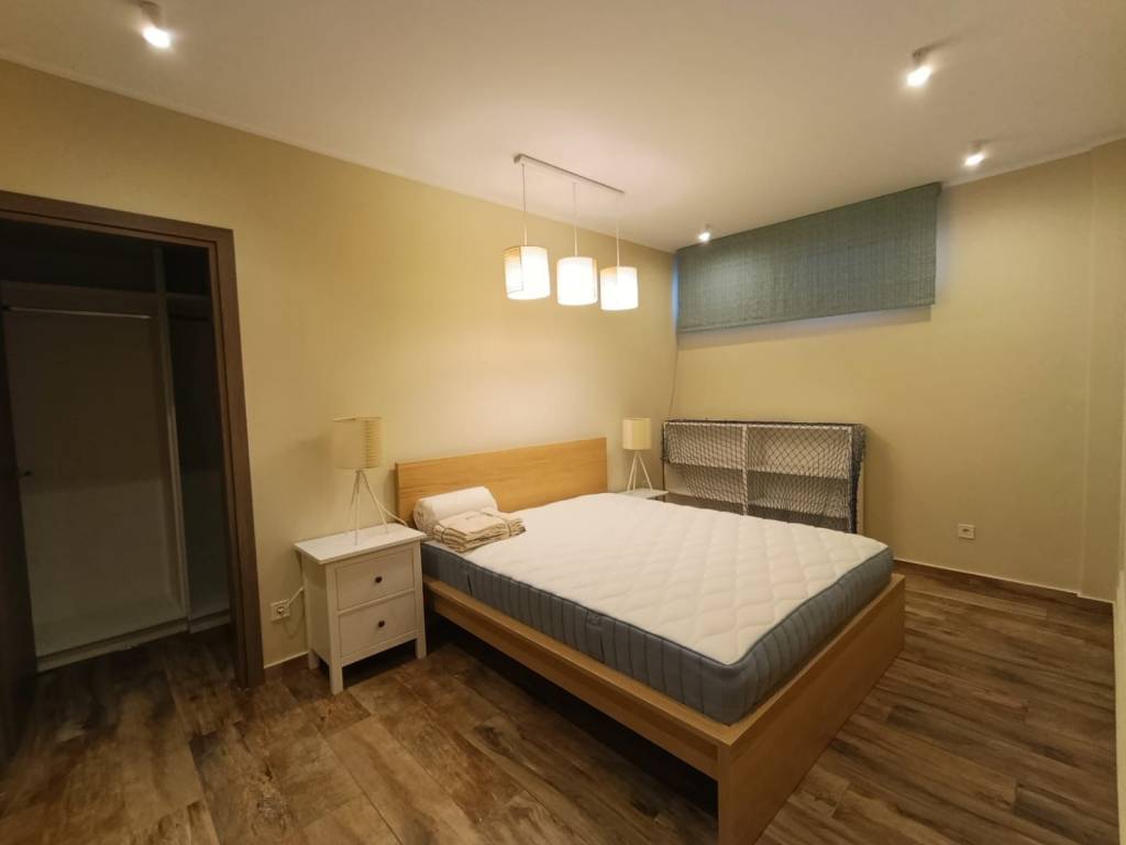 Bedroom with a dressing room in the basement