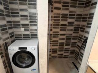 Forumland Real Estate, Μπάνιο