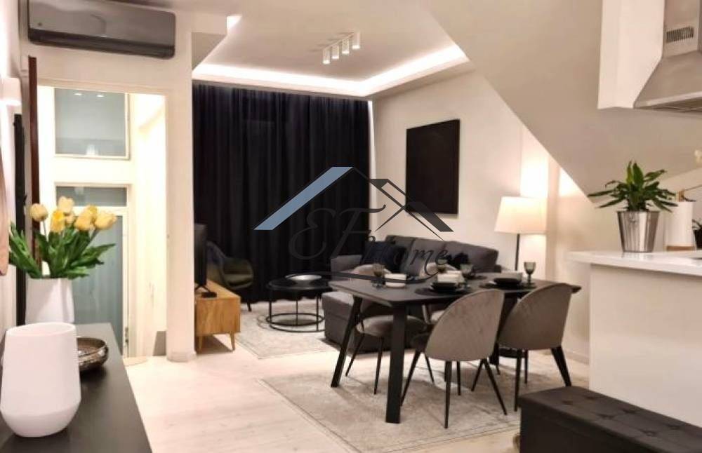 Ενιαίος χώρος σαλόνι-τραπεζαρία