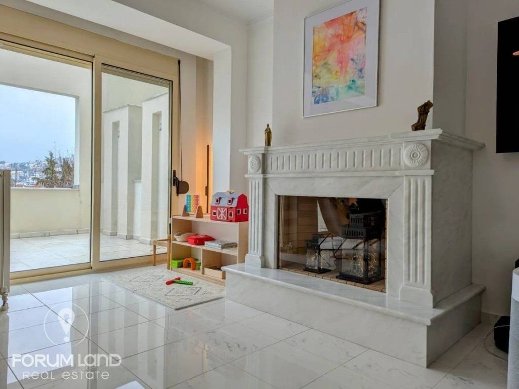 Forumland Real Estate, Σαλόνι με τζάκι