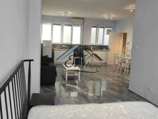 Ενιαίος χώρος κουζίνα- σαλόνι-υπνοδωμάτιο