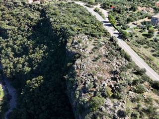 Drone shot with plot on the right and gorge