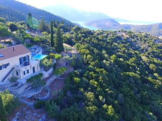Aerial view of the house and land