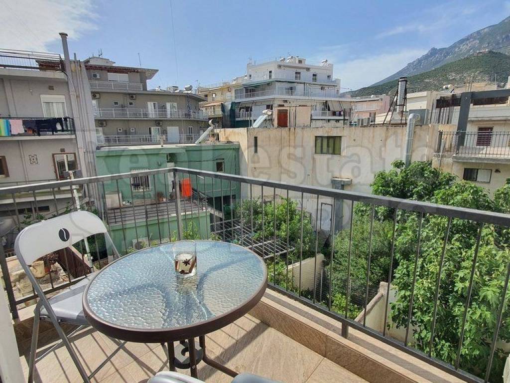 ΜΠΑΛΚΟΝΙ ΜΕ ΘΕΑ ΒΟΥΝΟ