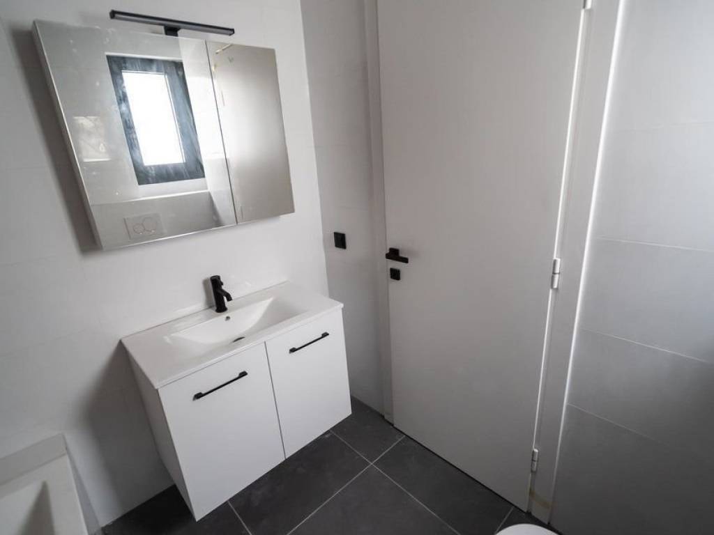 Forumland Real Estate, Μπάνιο