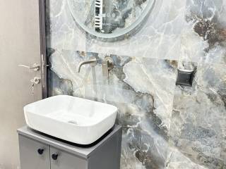 Forumland Real Estate, Μπάνιο