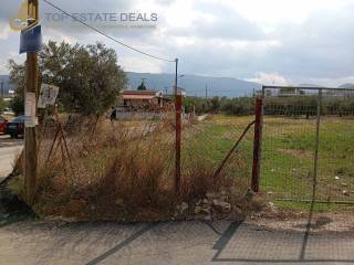 Περιφραγμένο οικόπεδο στην συμβολή 2 κοινοτικών δρόμων