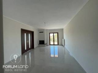 Forumland Real Estate, Σαλόνι με τζάκι