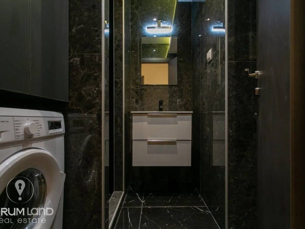 Forumland Real Estate, Μπάνιο