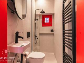 Forumland Real Estate, Μπάνιο