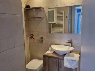 Forumland Real Estate, Μπάνιο