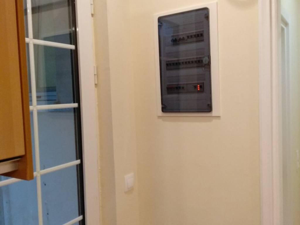 Electricity Board, kitchen door to veranda