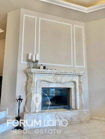 Forumland Real Estate, Σαλόνι με τζάκι