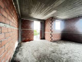 Το καθιστικό και η κουζίνα.