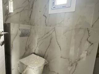 Forumland Real Estate, Μπάνιο