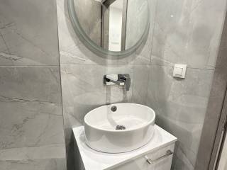 Forumland Real Estate, Μπάνιο