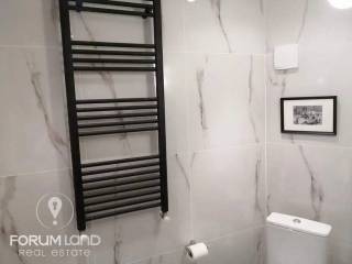Forumland Real Estate, Μπάνιο