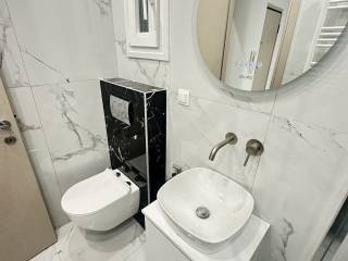 Forumland Real Estate, Μπάνιο