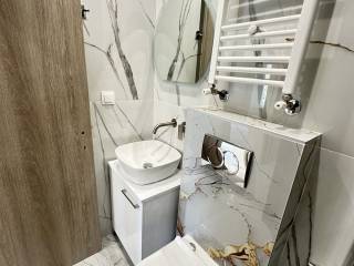 Forumland Real Estate, Μπάνιο