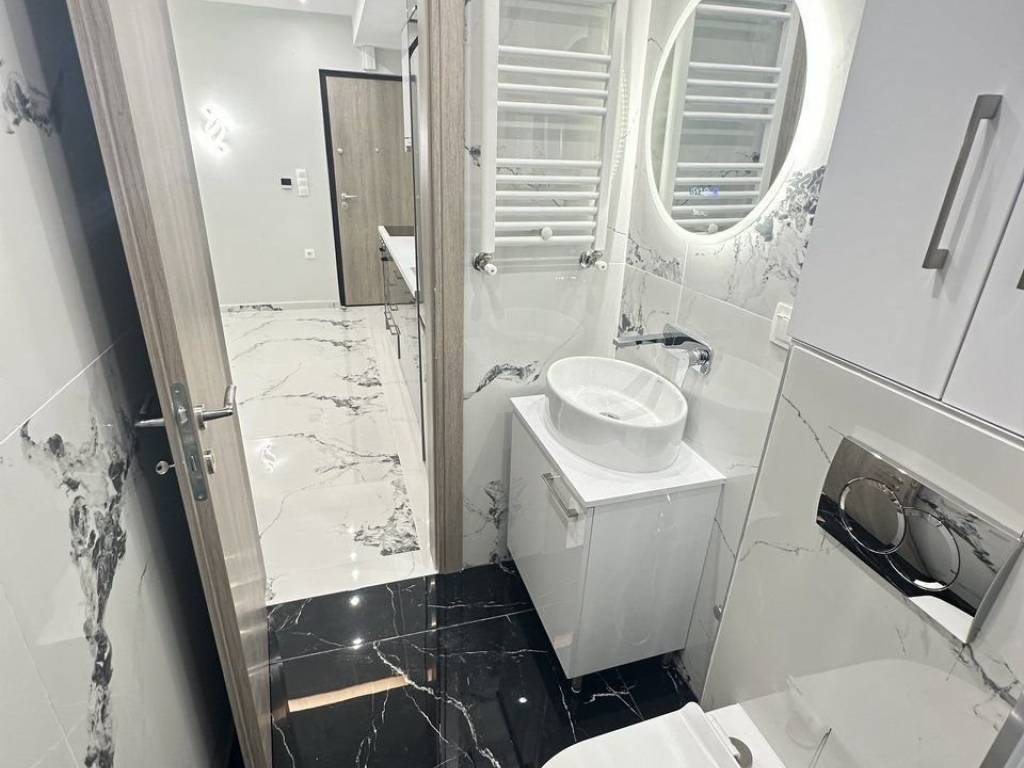 Forumland Real Estate, Μπάνιο