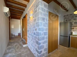 ground floor hall to bed 2, guest WC, stairs and kitchen