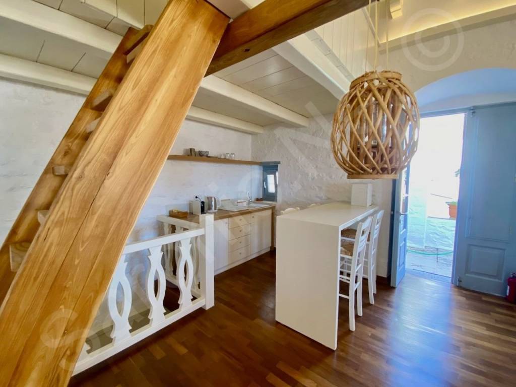 Top floor, door to entrance terrace, kitchenette, Mezz stair