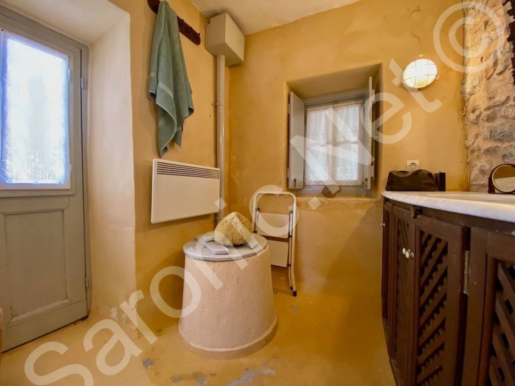 Shower room, cisterna below, doors to entrance courtyard