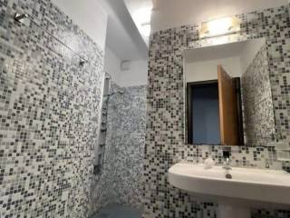 Forumland Real Estate, Μπάνιο