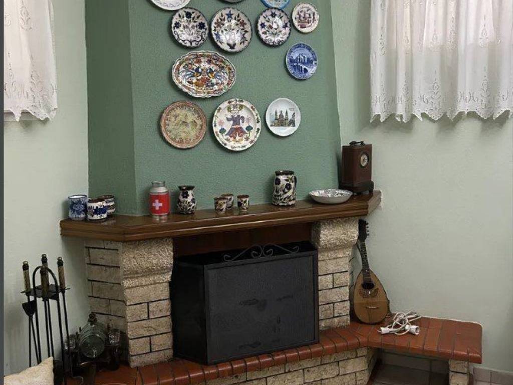 Forumland Real Estate, Σαλόνι με τζάκι