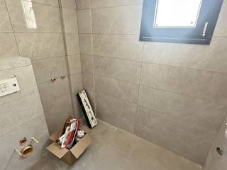 Forumland Real Estate, Μπάνιο