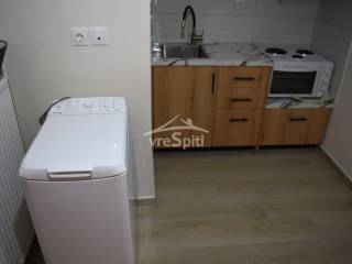 ΚΟΥΖΙΝΑ ΜΕ ΣΥΣΚΕΥΕΣ ΕΞΟΠΛΙΣΜΕΝΗ