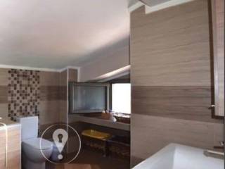 Forumland Real Estate, Μπάνιο