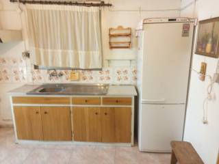 E KOYZINA TES MONOKATOIKIAS