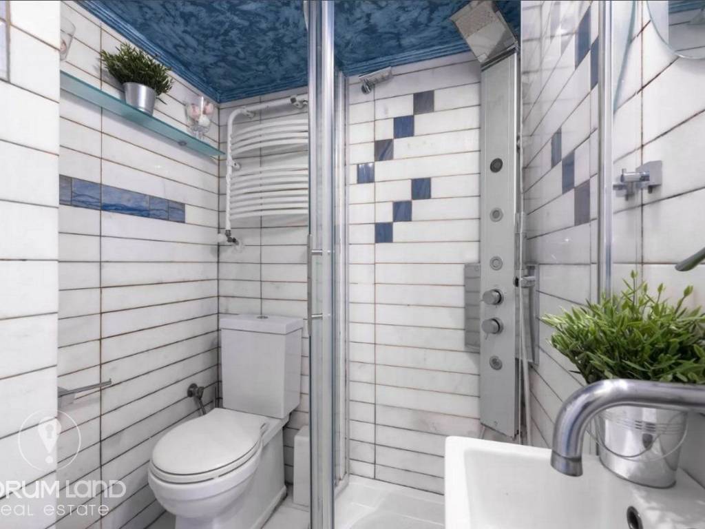 Forumland Real Estate, Μπάνιο