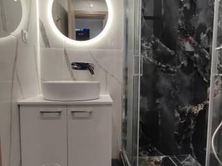 Forumland Real Estate, Μπάνιο