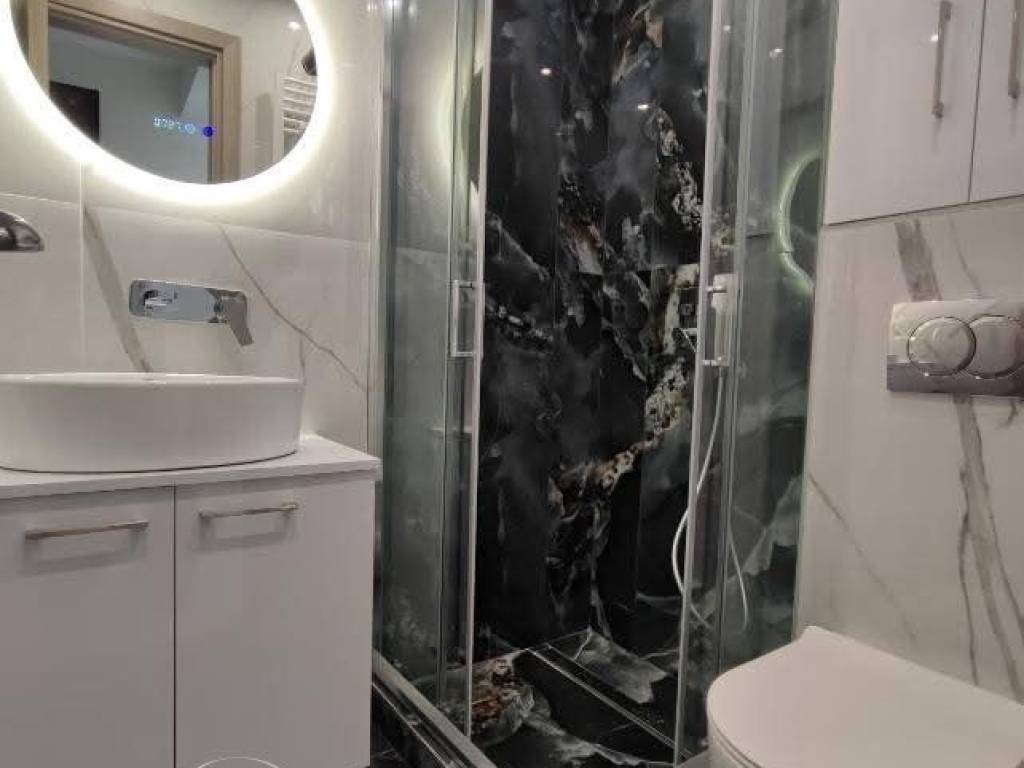 Forumland Real Estate, Μπάνιο