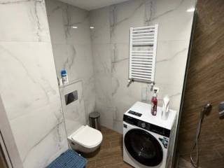 Forumland Real Estate, Μπάνιο