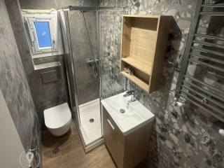 Forumland Real Estate, Μπάνιο